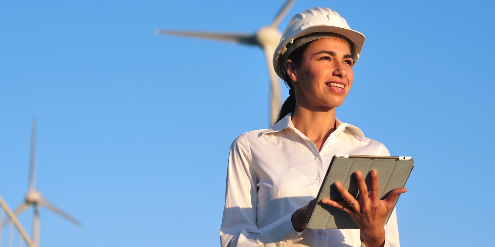 Architect Woman At Windfarm Aspect Ratio 1160 580