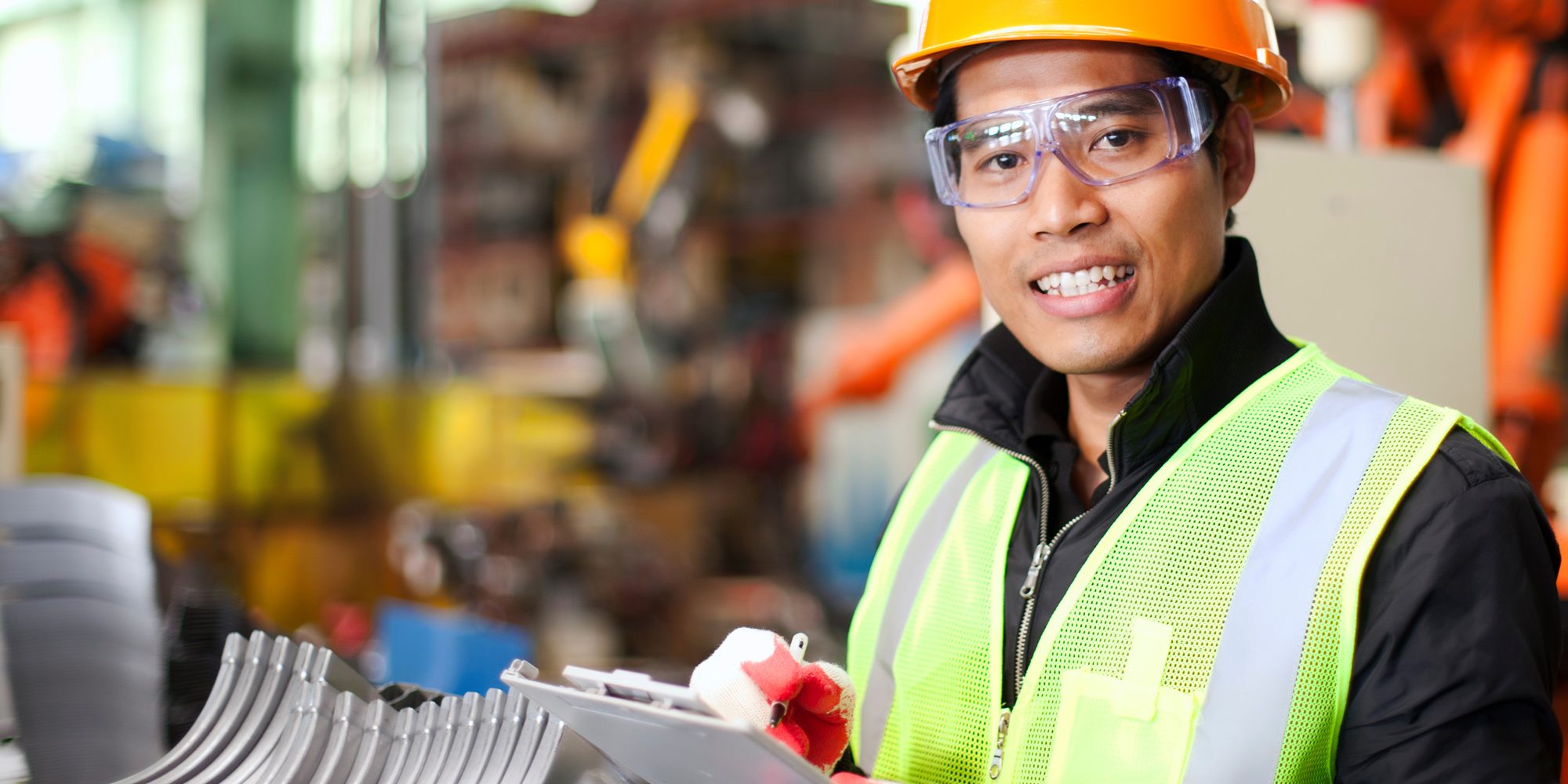 Man In Construction Site With Clipboard And Hardhat Aspect Ratio 1160 580