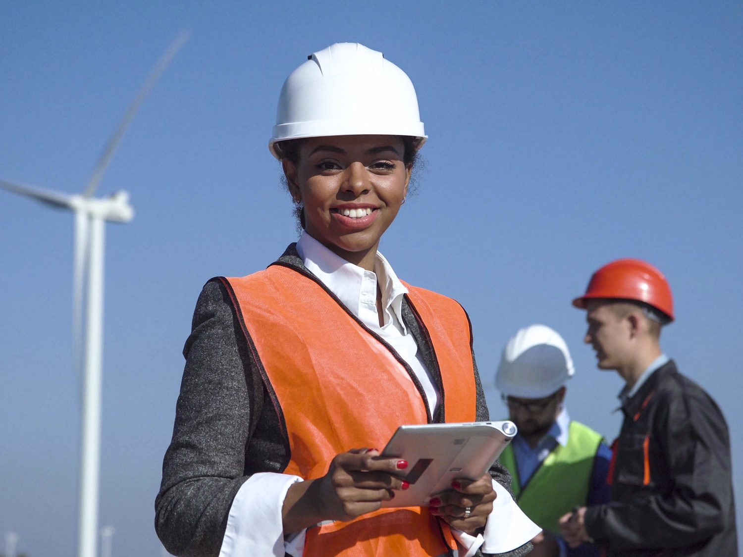 Woman In Group With Hardhats Aspect Ratio 800 600