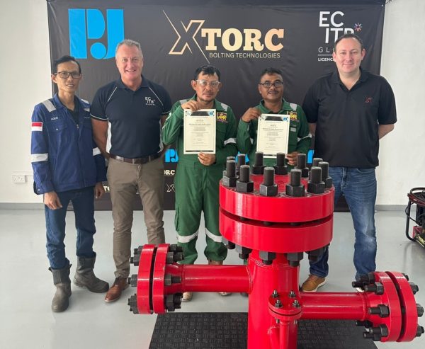 ECITB Global's Jason Riley, second left, at XTorc in Indonesia to see the MJI Blended Learning course